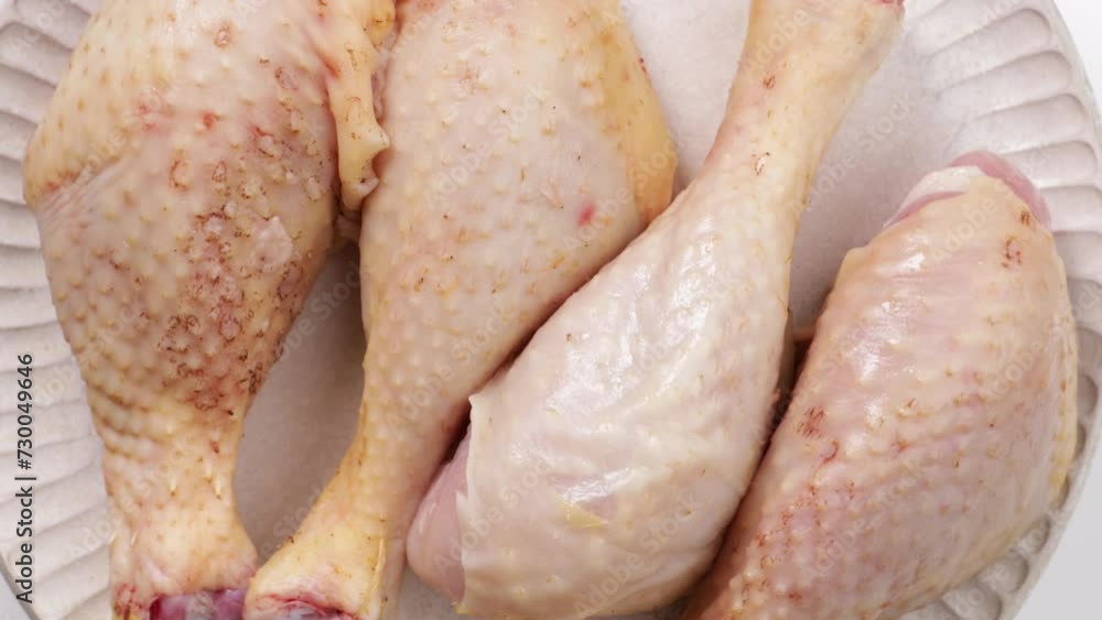 raw chicken thighs on light surface top view food