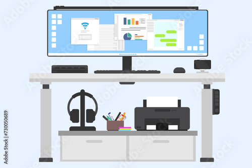 Ultrawide monitor on modern worktables, Workplace and working space concept, Front view of clean desk, Printer and headphone and phone charger on the adjustable desk.
