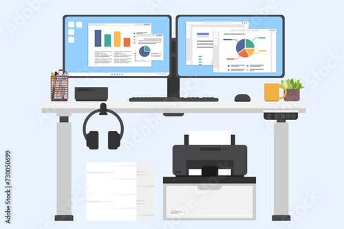 Adjustable desk with computer and printer, Computer with two monitor, Front view of modern worktables, Workplace and working space concept.