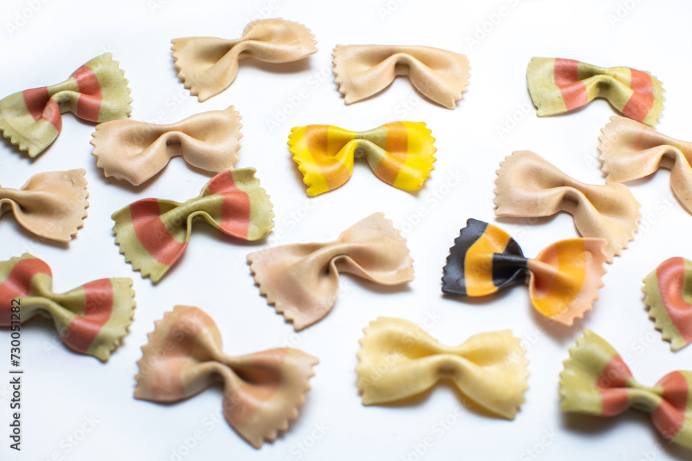 farfalle pasta shapes isolated on white surface farfalle pasta shapes isolated on white surface