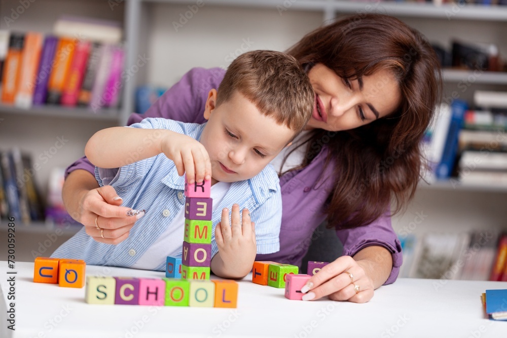 Fototapeta premium Teacher learning child in classroom School education conceptav