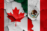 flags of Canada and Mexico painted on cracked wall