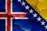 flags of Iceland and Bosnia and Herzegovina painted on cracked wall