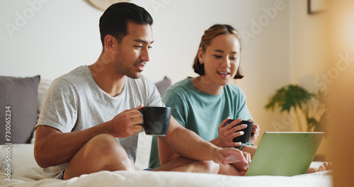 Relax, laptop and search with couple in bed and coffee streaming with subscription, internet and watching movie. Connection, wake up and marriage with man and woman with social media, news and online photo