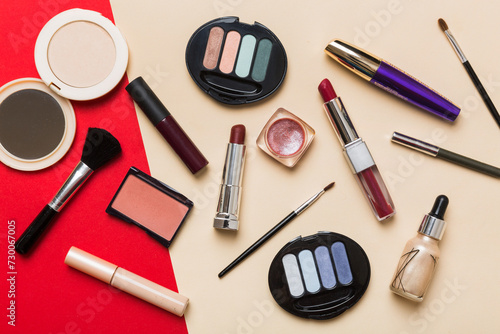 Professional makeup tools. Top view. Flat lay. Beauty, decorative cosmetics. Makeup brushes set and color eyeshadow palette on table background. Minimalistic style