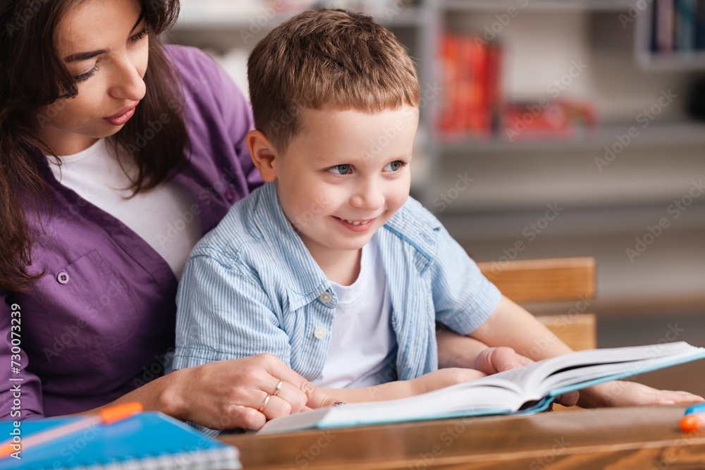 Teacher learning child in classroom School education concept Teacher learning child in classroom School education concept