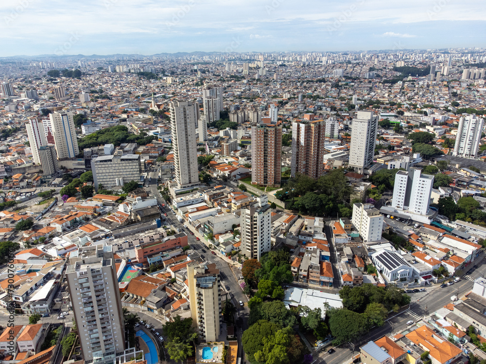 Fototapeta premium São Paulo megalopolis full of buildings seen from above by drone