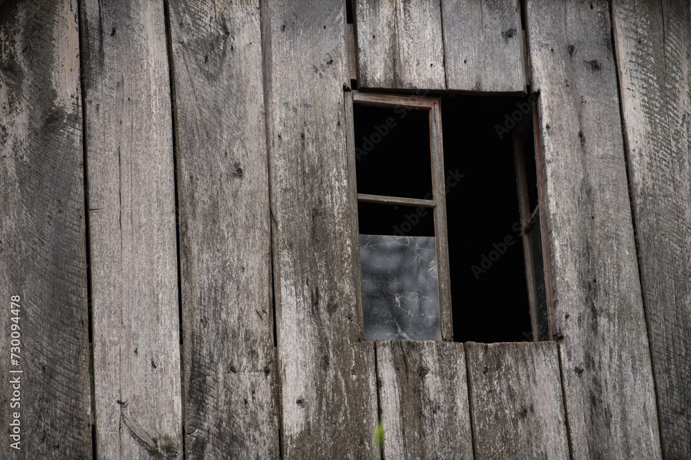 Croatia, October 20,2023 : Rustic style aged window at rural home wall. Croatia, October 20,2023 : Rustic style aged window at rural home wall.
