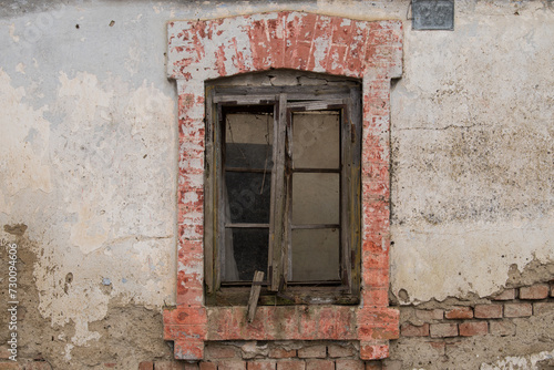 Croatia, October 20,2023 : Rustic style aged window at rural home wall.