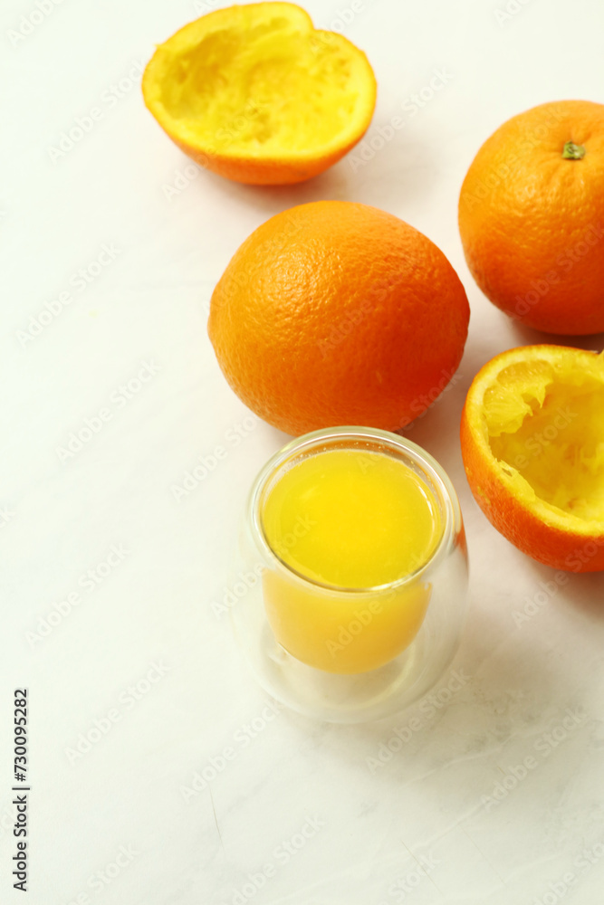 Fresh ripe juicy oranges on light background Fresh ripe juicy oranges on light background