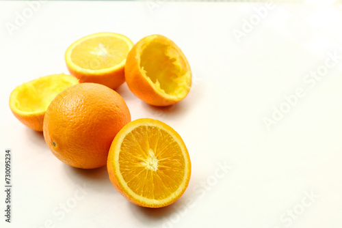 Fresh ripe juicy oranges on light background