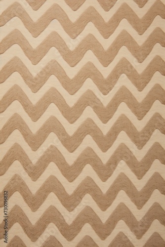 Beige zig-zag wave pattern carpet texture background © GalleryGlider