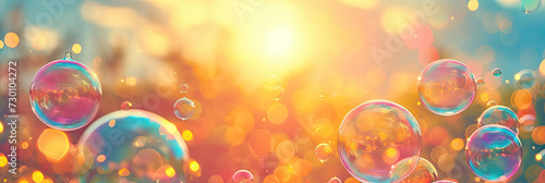 bubbles in the sky with sunlight shining at sunset