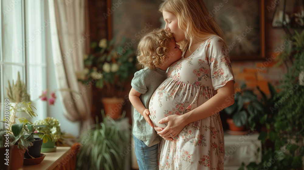 Young girl kissing belly of her pregnant mother. Caucasian girl kissing belly of pregnant mother. Pregnant mother and daughter having fun time at home. Happy for the new sister. Girl touching pregnant