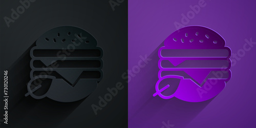 Paper cut Vegan food diet icon isolated on black on purple background. Organic, bio, eco symbol. Vegan, no meat, lactose free, healthy, fresh and nonviolent food. Paper art style. Vector