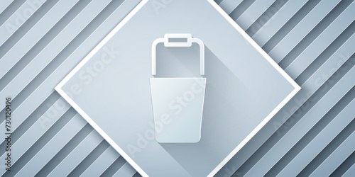 Paper cut Sauna bucket icon isolated on grey background. Paper art style. Vector