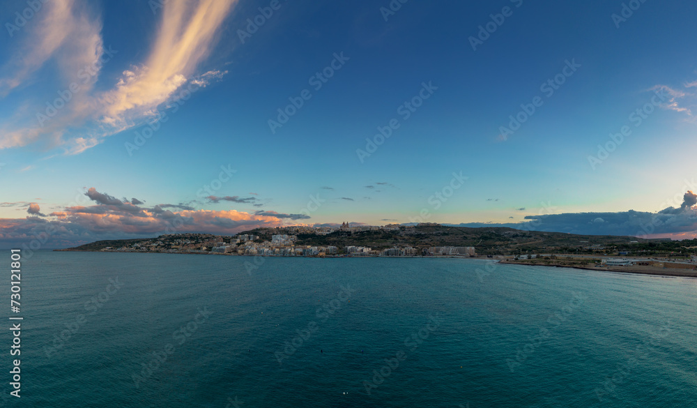 panorama landscape view of Mellieha Bay in Malta at sunset panorama landscape view of Mellieha Bay in Malta at sunset