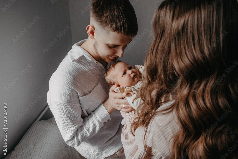 Dad kissing and hugging baby Dad kissing and hugging baby
