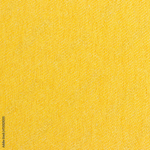 Close-up yellow or golden mustard fabric surface texture. Brown texture for background
