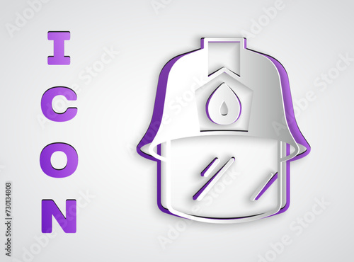 Paper cut Firefighter helmet or fireman hat icon isolated on grey background. Paper art style. Vector