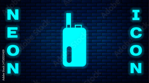 Glowing neon Electronic cigarette icon isolated on brick wall background. Vape smoking tool. Vaporizer Device. Vector