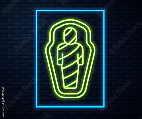 Glowing neon line Egypt mummy in sarcophagus icon isolated on brick wall background. Vector