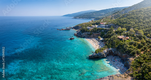 Fototapeta Naklejka Na Ścianę i Meble -  Aerial view of the coast of the North Pelion Mountain, Greece, with emerald shining sea at the popular Milopotamos Beach