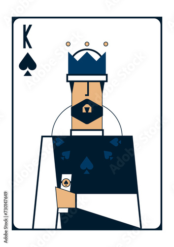 Stylised simplified image of a playing card with a king of spades in dark clothes, clutching a parchment with a decree photo