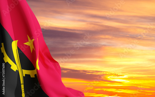 Flag of Angola against the sunset sky