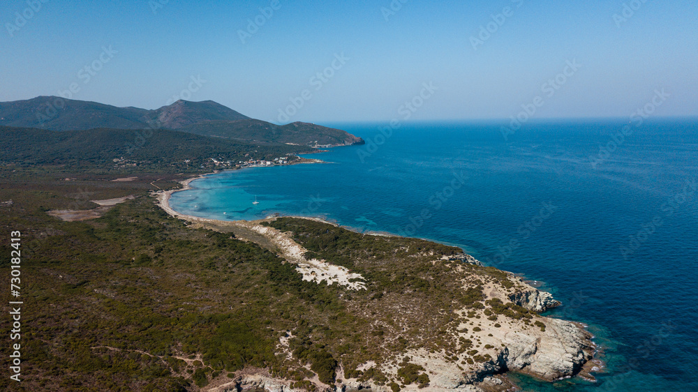 Drone photography genoise tower, cala and barcaggio beach with turquoise waters in Cap Corse 