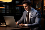 Financial expert office worker in suit working on laptop