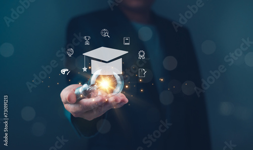 Innovative Education Concept with Light Bulb and Icons A person holding a light bulb with education-themed icons, symbolizing innovative learning and creative educational ideas.
