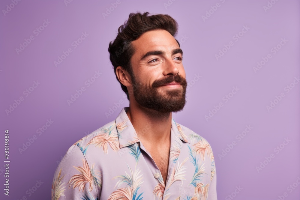 Portrait of a handsome young man in shirt on purple background. Portrait of a handsome young man in shirt on purple background.