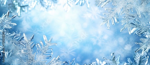 Christmas ice background with frosty crystal border. © 2rogan