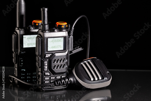 Portable two-way radios with microphone