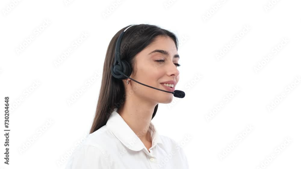 Profile portrait of a Friendly Caucasian woman call center agent talking with clients or customers, making telemarketing over white background. Profile portrait of a Friendly Caucasian woman call center agent talking with clients or customers, making telemarketing over white background.