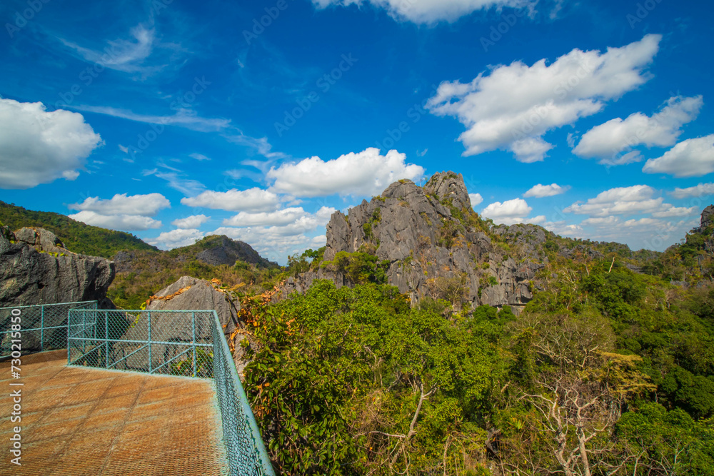 Fototapeta premium Aerial panorama of Thailand's National Park, there is a well-known tourist destination with views of the forest and limestone mountain.