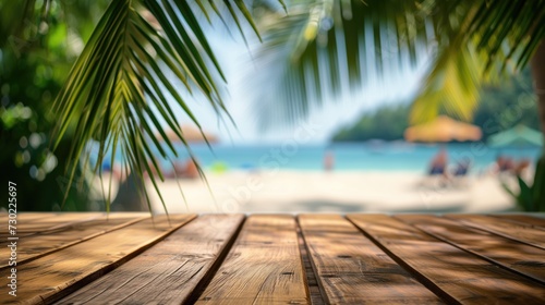 Empty wooden table and palm leaves with blur beach on background in summer time  can be used for product placement  generative ai