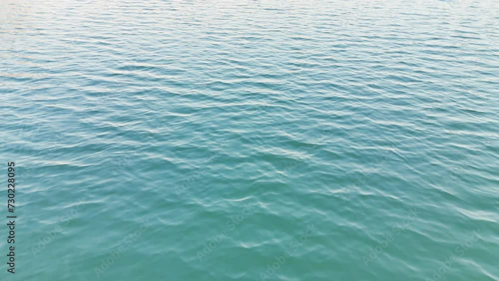Blue water waves created by natural winds Blue water waves created by natural winds
