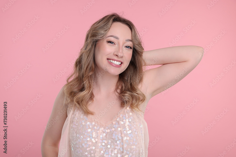 Portrait of smiling woman on pink background Portrait of smiling woman on pink background