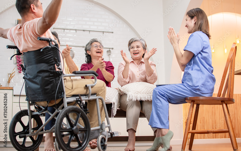 Group of happy elderly people, doctor talking together in community, playing game, consulting mental health, smiling with happiness, sitting in indoor nursing home. Retirement, Healthcare Concept.