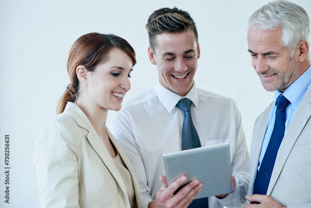 Business people, tablet and discussion on proposal in workplace, communication and meeting in office. Senior manager, employees and technology for assistance in training, mentor and advice for work Business people, tablet and discussion on proposal in workplace, communication and meeting in office. Senior manager, employees and technology for assistance in training, mentor and advice for work