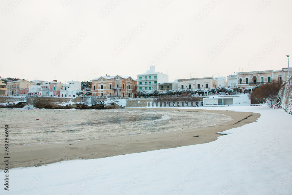Santa Maria al Bagno beach after a exceptional snowfall, Salento, Apulia, Italy