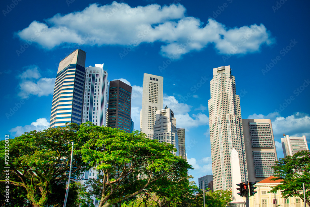 Singapore city skyline of business district downtown on blue sky with cloud in daytime. Singapore city skyline of business district downtown on blue sky with cloud in daytime.