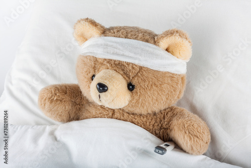 Sick Teddy Bear wrapped in bandages