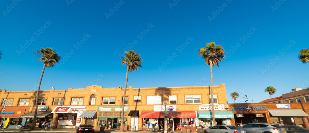 stores under a blue sky in Newport seafront