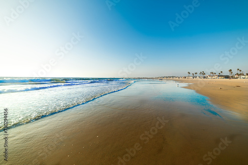 Small waves in Newport Beach on a clear day