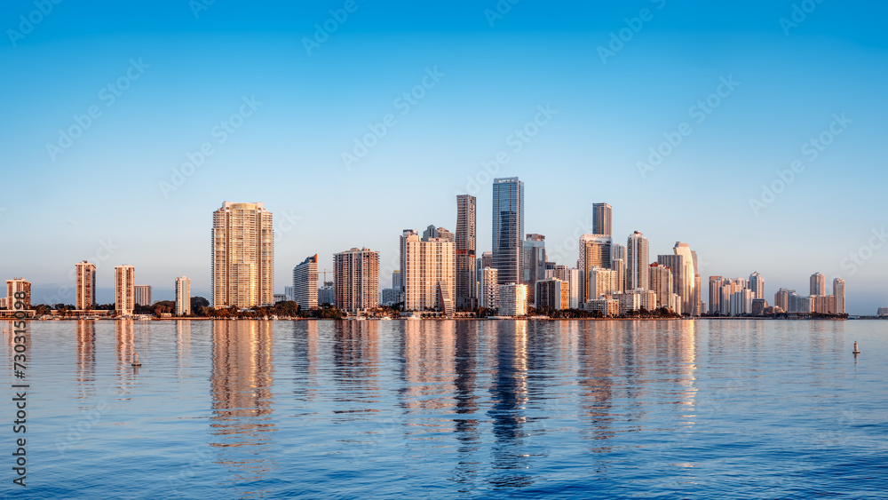 the skyline of miami during sunrise
