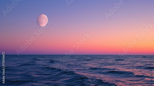 The sea s gentle lullaby accompanies the moon s rise  creating an enchanting seascape