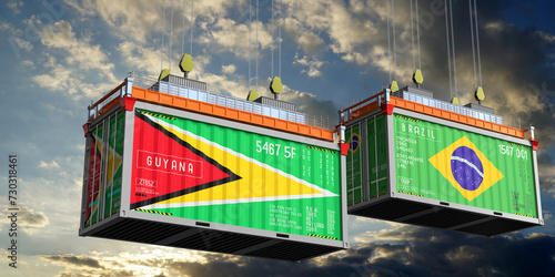 Shipping containers with flags of Guyana and Brazil - 3D illustration